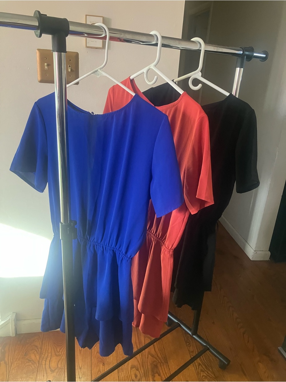Women’s Short Sleeve Ruffle Hem rompers - Royal Blue, black, rust/burnt orangey